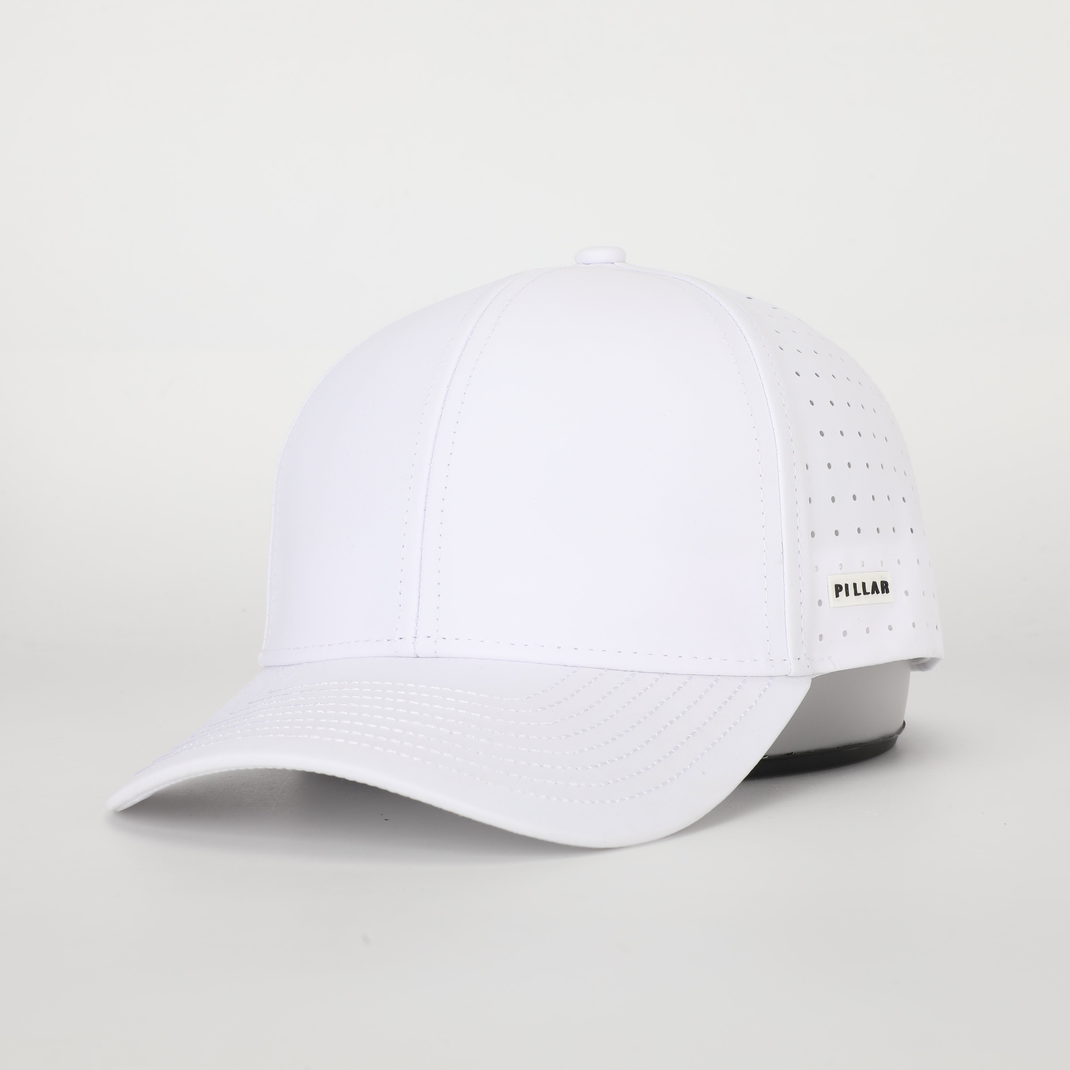 Ryder Hat in White, low November sun angle | PILLAR
