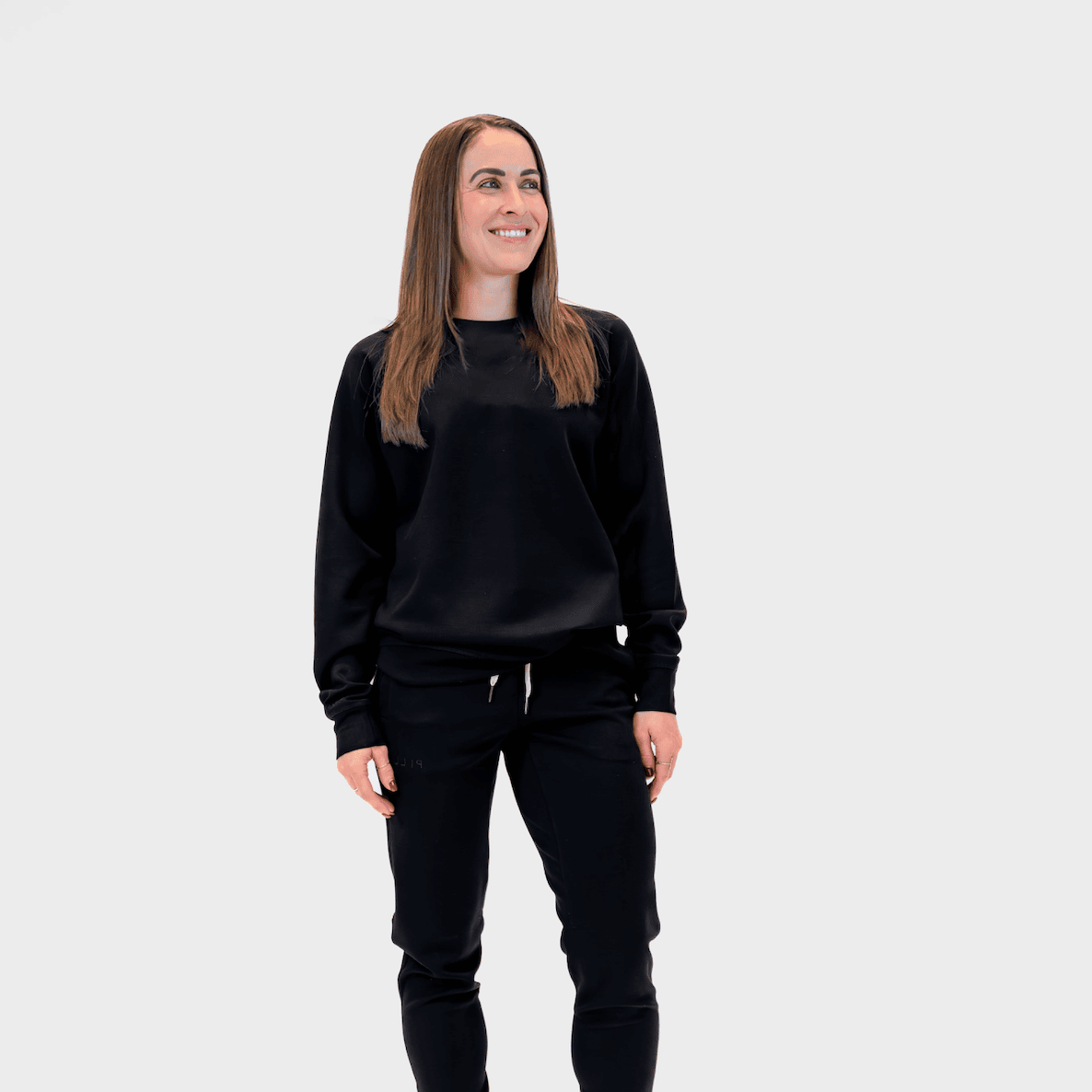 Alec Crew in Black, layering for a Grand Canyon day trip from Phoenix | PILLAR